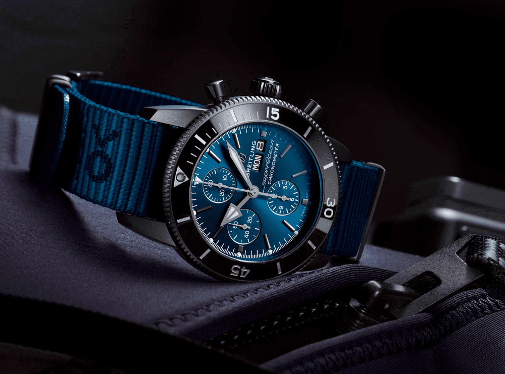 Breitling Breitling Superocean Heritage Chronograph 44 Outerknown M133132A1C1W1, superocean heritage швейцария мужские часы на браслете тканевый боковой вид